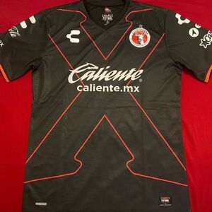 Club Tijuana Xolos Soccer Jersey – Charly Futbol – Black/Red “X”